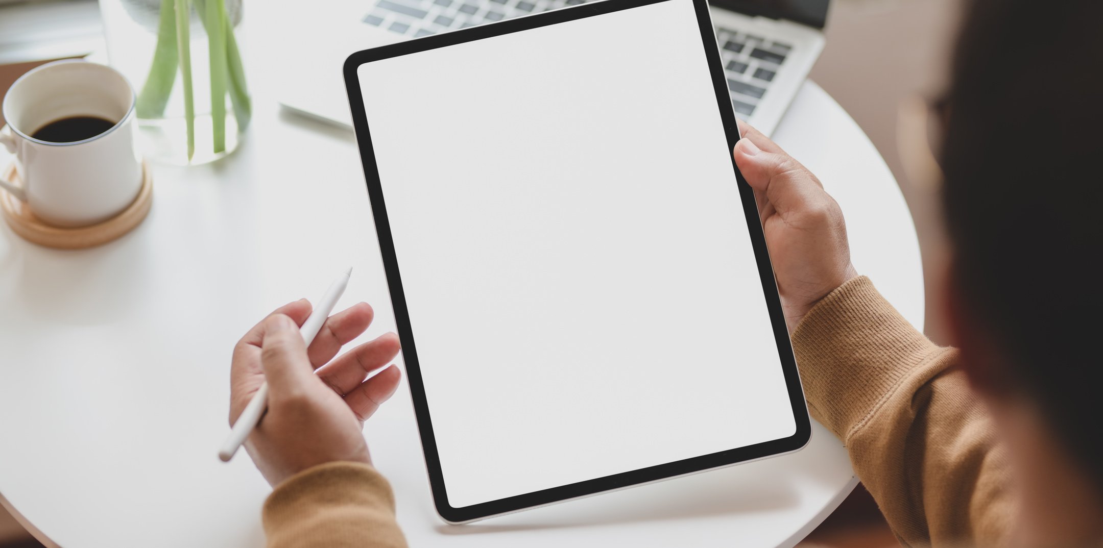 Person Holding White Tablet Computer